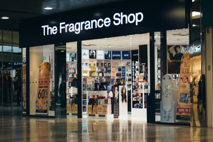 Perfume store with promotional displays and signage