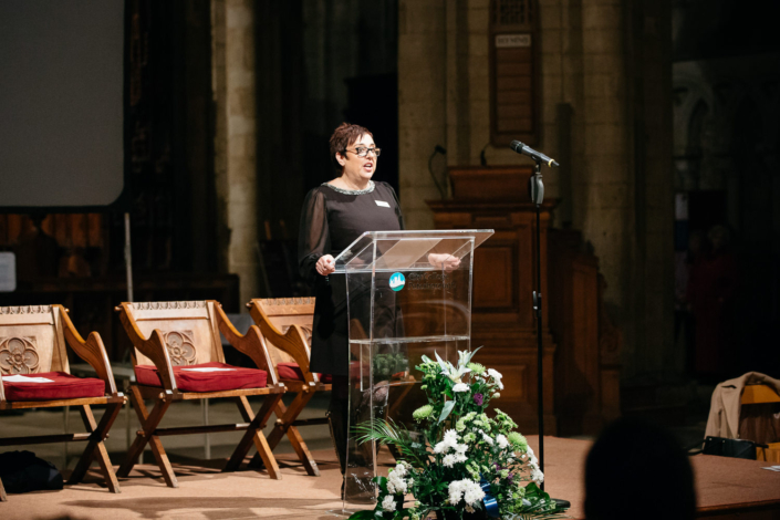Woman giving speech at a formal event