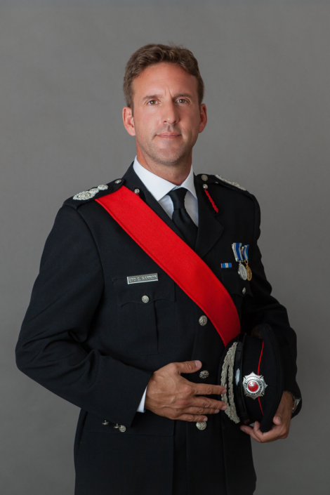 Uniformed officer with awards and ceremonial attire