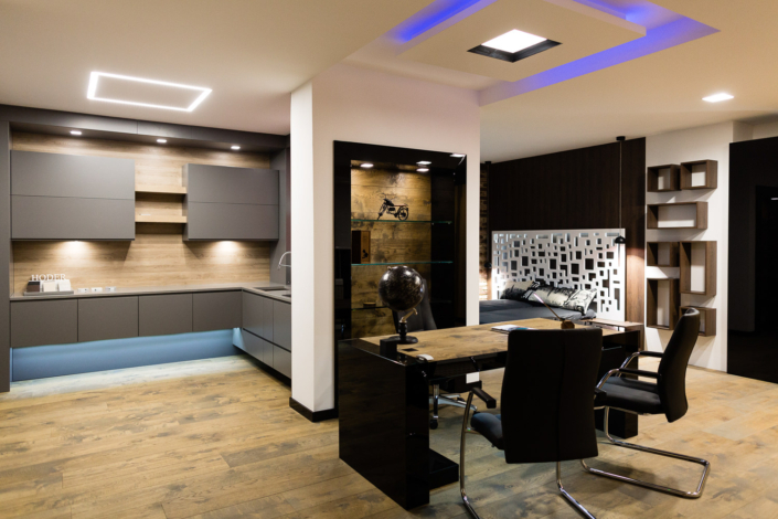 Modern open-concept home office and kitchen